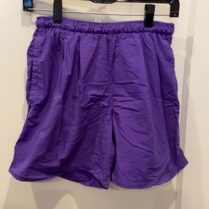 REI purple nylon swim trunks